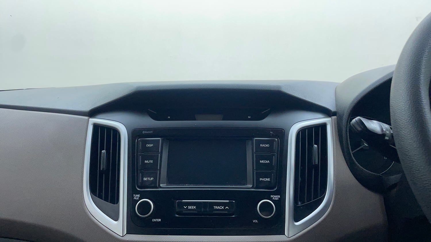 Used 2018 Hyundai Creta E Plus 1.6 Petrol Petrol Manual top_features Integrated (in-dash) music system