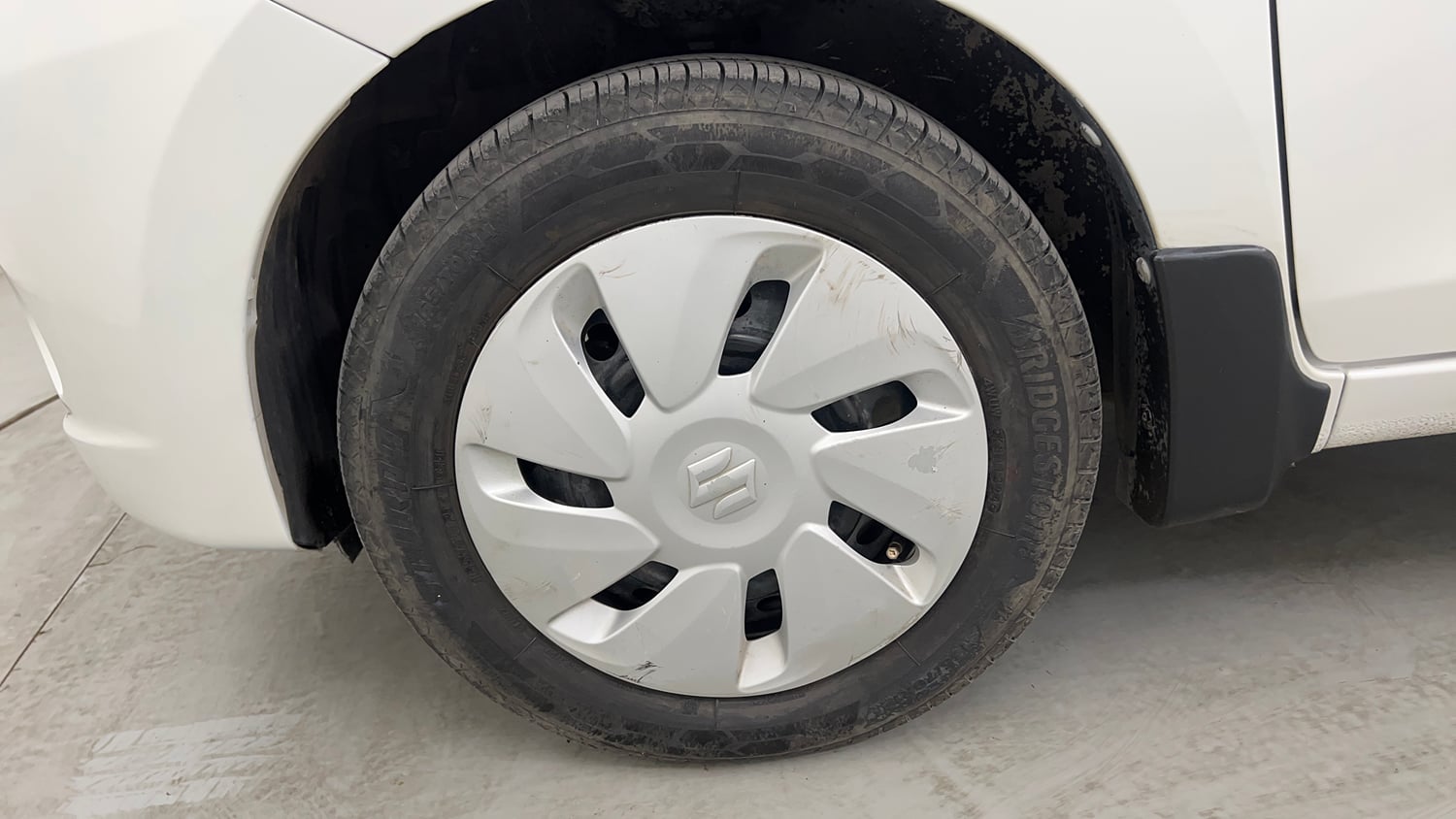 Used 2015 Maruti Suzuki Celerio VXi AMT Petrol Automatic tyres LEFT FRONT TYRE RIM VIEW