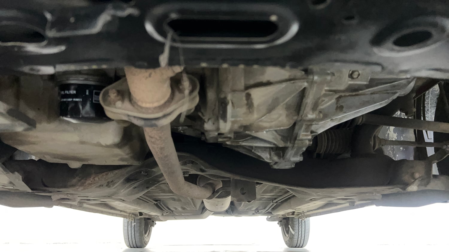 Used 2015 Maruti Suzuki Celerio VXi AMT Petrol Automatic extra FRONT LEFT UNDERBODY VIEW