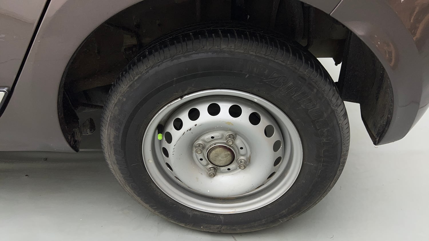 Used 2019 Tata Tiago Revotron XE Petrol Manual tyres LEFT REAR TYRE RIM VIEW