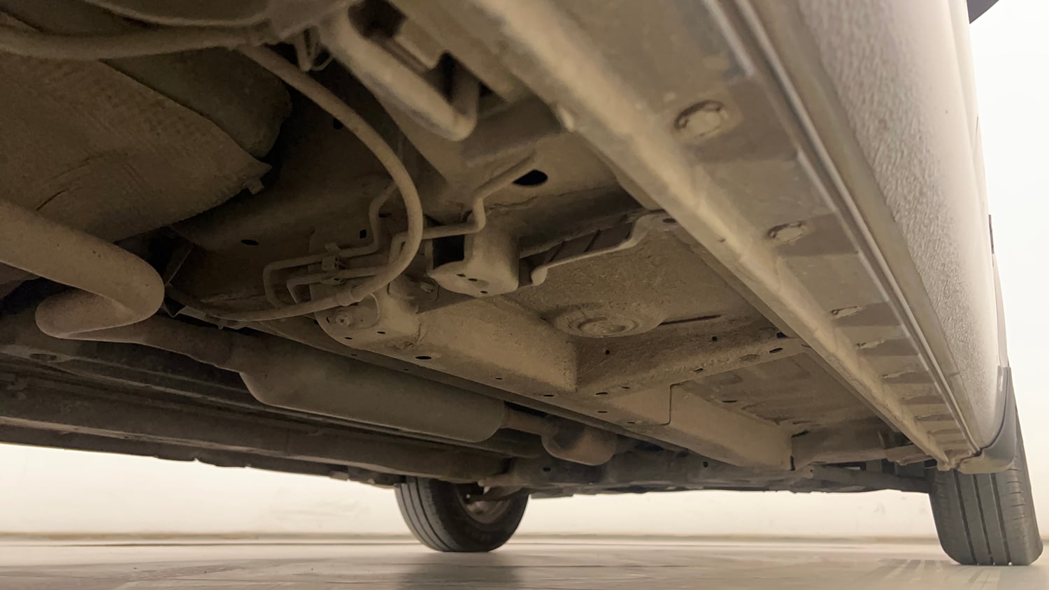 Used 2013 Maruti Suzuki Swift Dzire ZXI Petrol Manual extra REAR RIGHT UNDERBODY VIEW