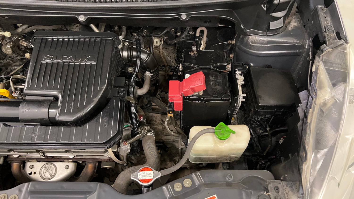 Used 2013 Maruti Suzuki Ertiga Vxi Petrol Manual engine ENGINE LEFT SIDE VIEW