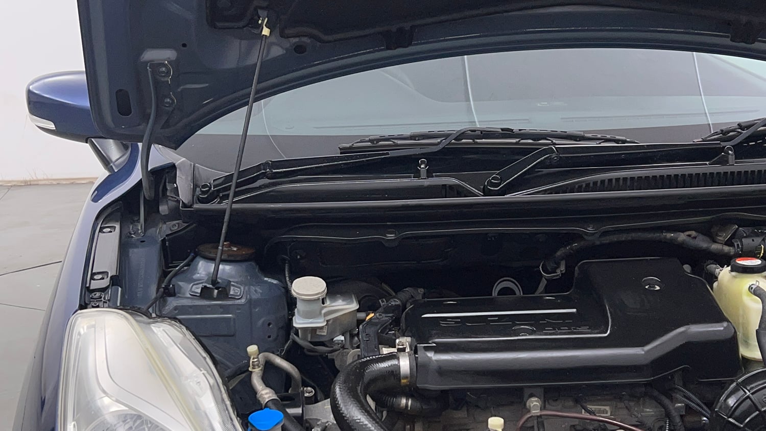 Used 2018 Maruti Suzuki Baleno Zeta 1.3 Diesel Manual engine ENGINE RIGHT SIDE HINGE & APRON VIEW