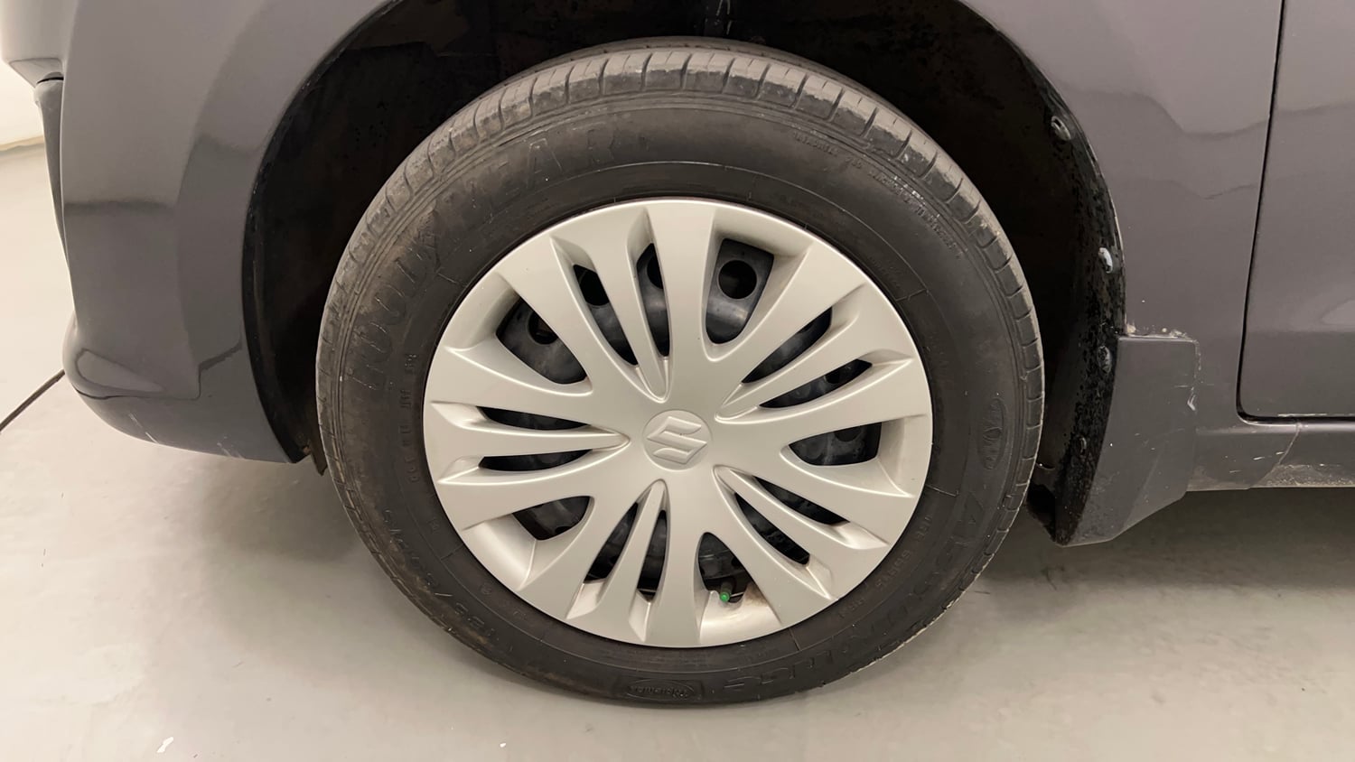 Used 2013 Maruti Suzuki Ertiga Vxi Petrol Manual tyres LEFT FRONT TYRE RIM VIEW