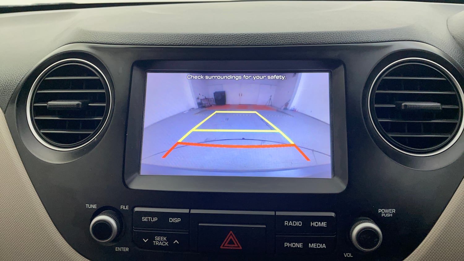 Used 2019 Hyundai Grand i10 Sportz 1.2 Kappa VTVT Petrol Manual top_features Integrated (in-dash) music system
