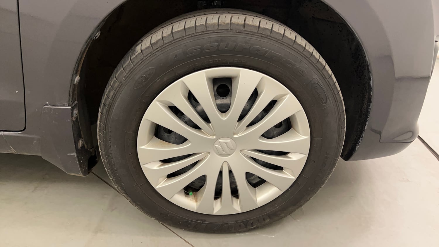 Used 2013 Maruti Suzuki Ertiga Vxi Petrol Manual tyres RIGHT FRONT TYRE RIM VIEW
