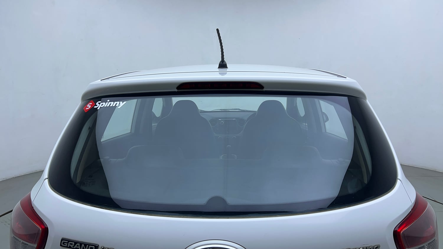 Used 2013 Hyundai Grand i10 Magna 1.2 Kappa VTVT Petrol Manual exterior BACK WINDSHIELD VIEW