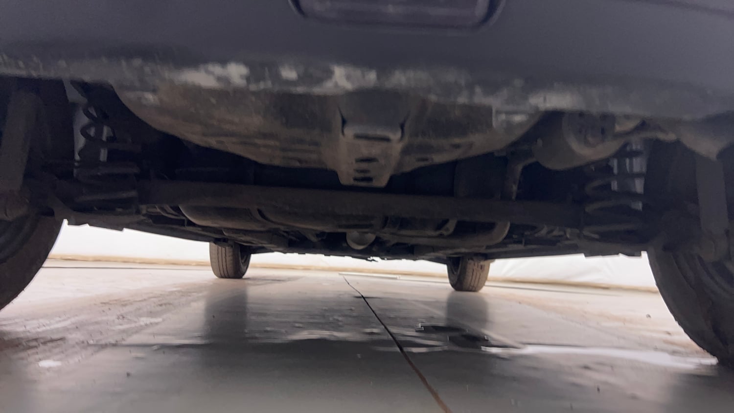 Used 2015 Maruti Suzuki Swift LXi Petrol Manual extra REAR UNDERBODY VIEW (TAKEN FROM REAR)