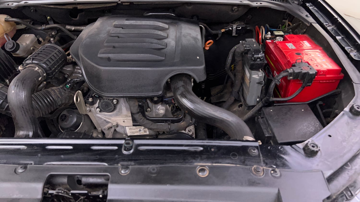 Used 2022 Mahindra Scorpio N Z8 L Petrol AT 7 STR Petrol Automatic engine ENGINE LEFT SIDE VIEW