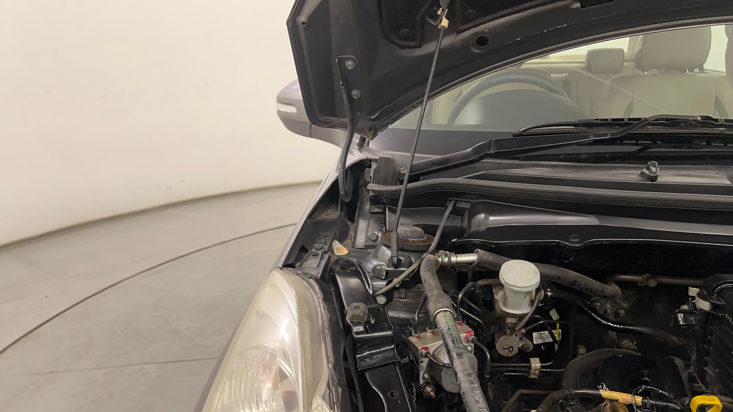 Used 2013 Maruti Suzuki Swift Dzire ZXI Petrol Manual engine ENGINE RIGHT SIDE HINGE & APRON VIEW