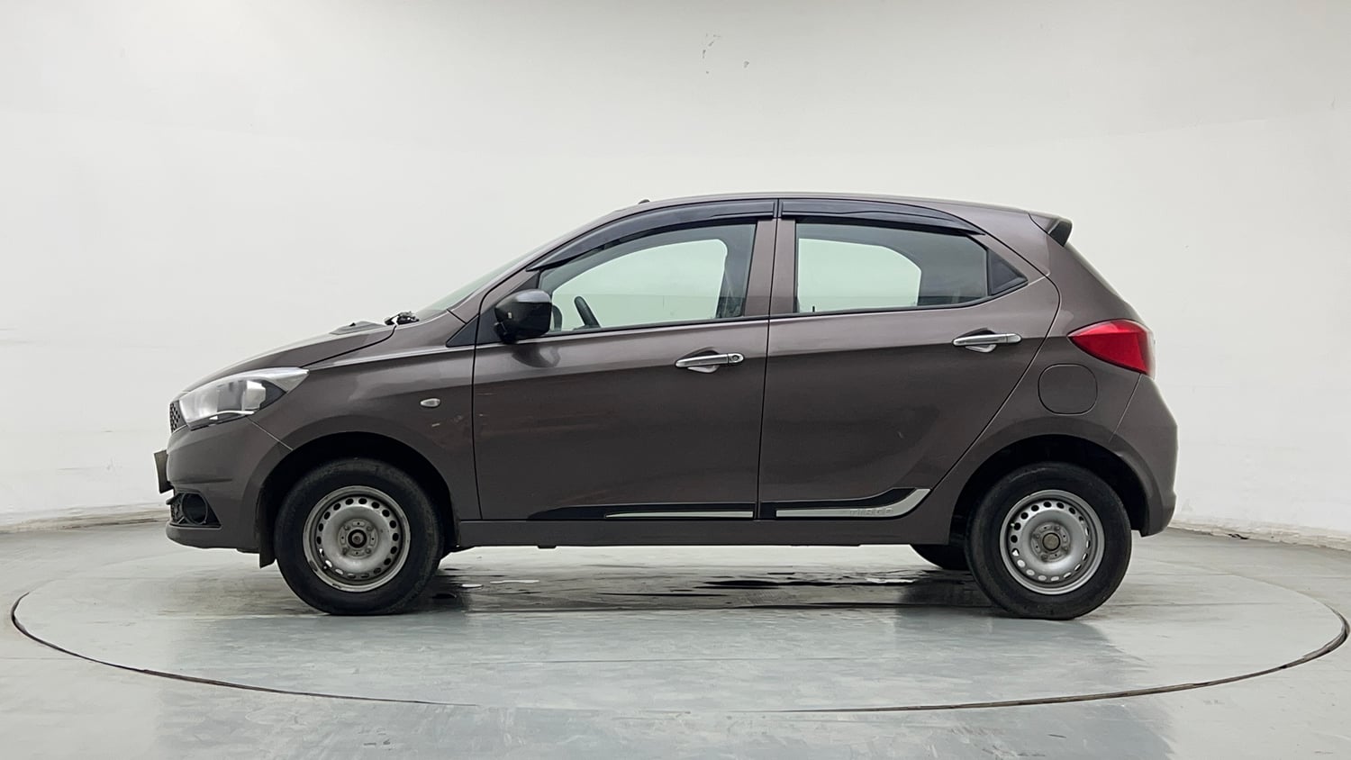 Used 2019 Tata Tiago Revotron XE Petrol Manual exterior LEFT SIDE VIEW