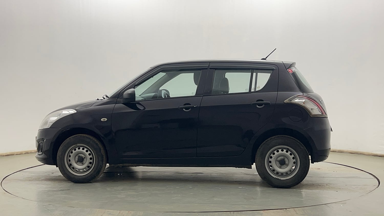 Used 2015 Maruti Suzuki Swift LXi Petrol Manual exterior LEFT SIDE VIEW