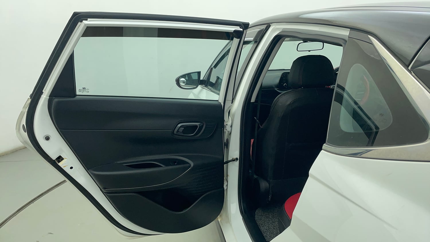 Used 2023 Hyundai i20 Sportz 1.2 MT Dual Tone Petrol Manual interior LEFT REAR DOOR OPEN VIEW