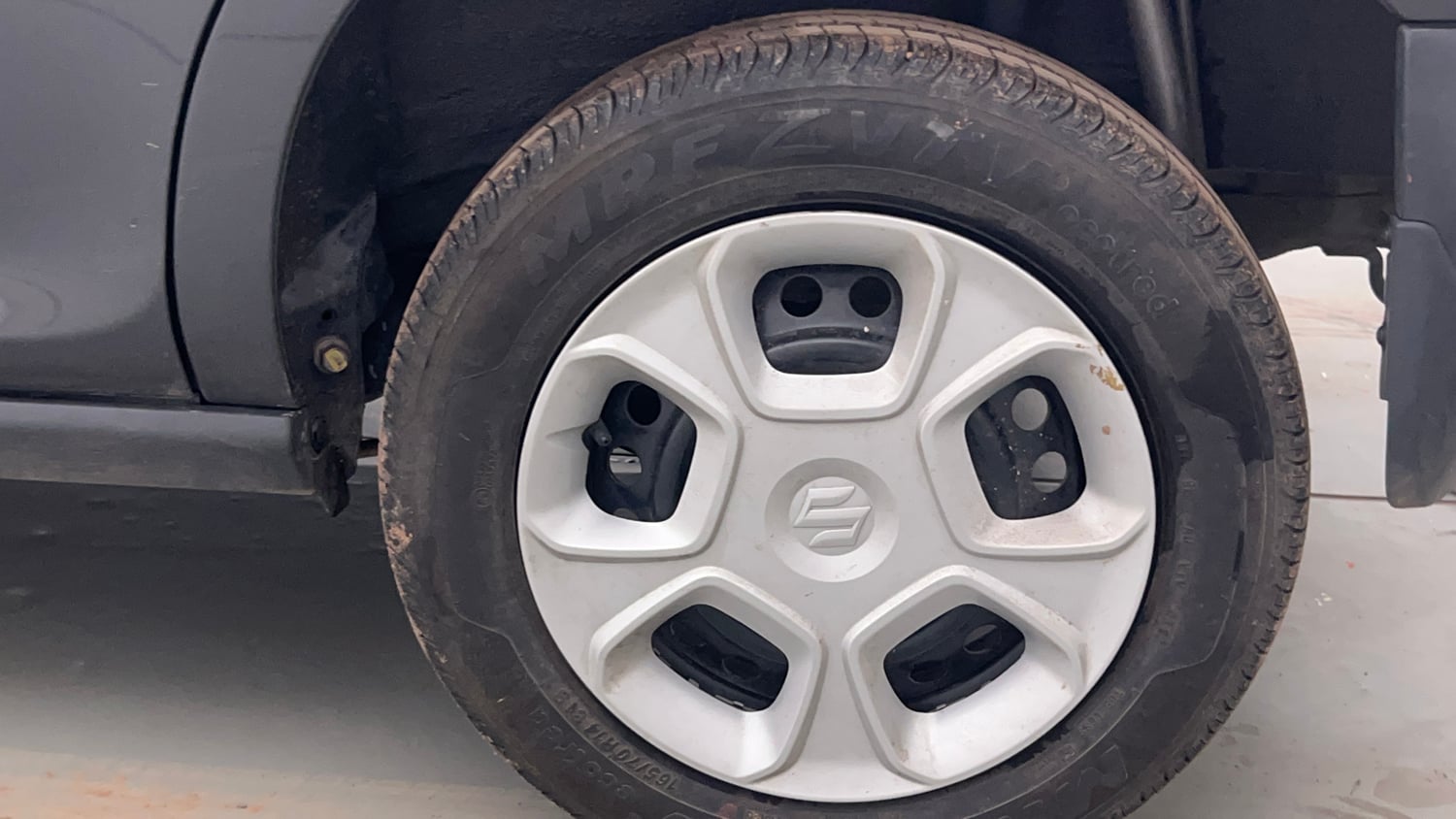 Used 2022 Maruti Suzuki S-Presso VXi (O) Petrol Manual tyres LEFT REAR TYRE RIM VIEW