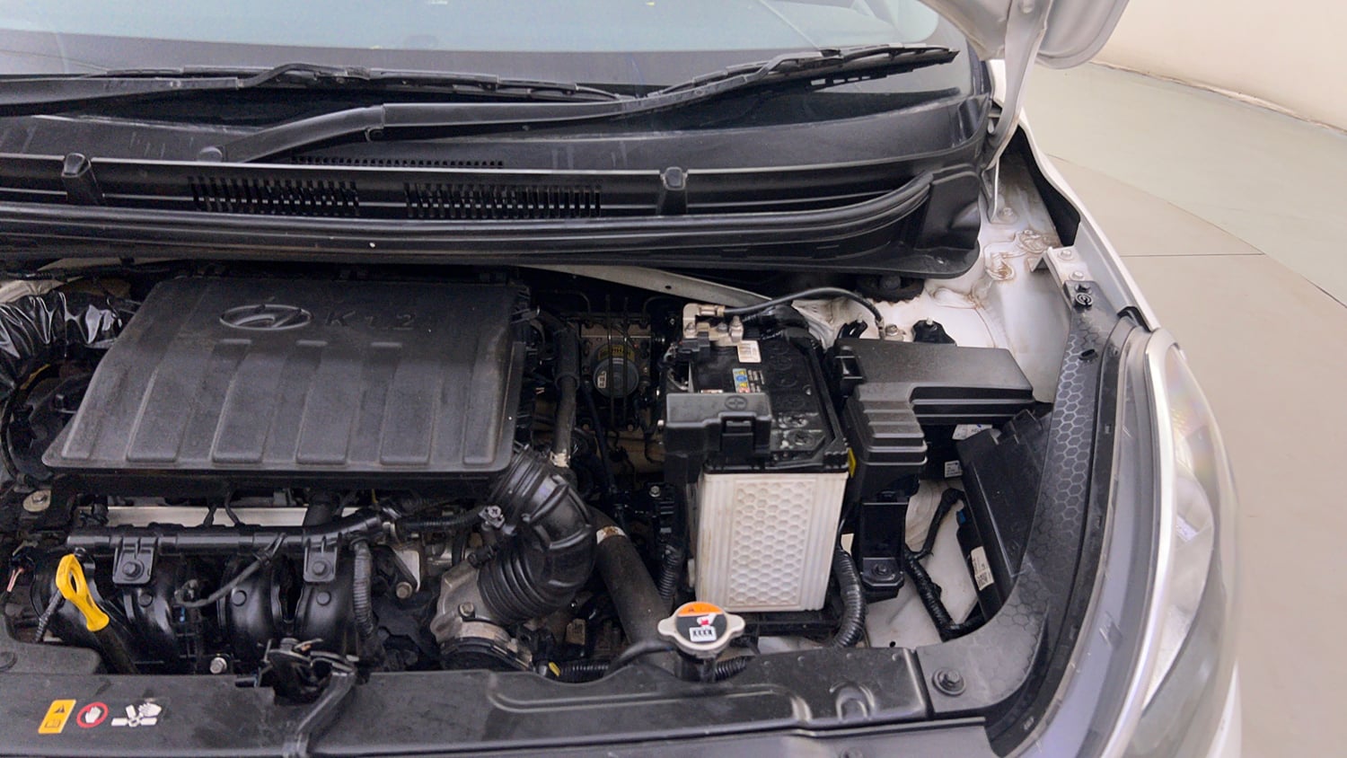 Used 2022 Hyundai Grand i10 Nios Sportz 1.2 Kappa VTVT Petrol Manual engine ENGINE LEFT SIDE HINGE & APRON VIEW