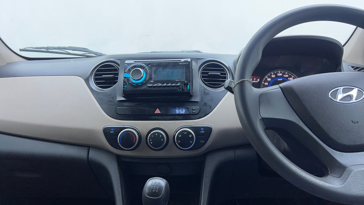 Used 2013 Hyundai Grand i10 Magna 1.2 Kappa VTVT Petrol Manual interior MUSIC SYSTEM & AC CONTROL VIEW