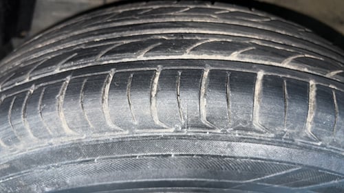 Used 2015 Maruti Suzuki Swift LXi Petrol Manual tyres LEFT FRONT TYRE TREAD VIEW