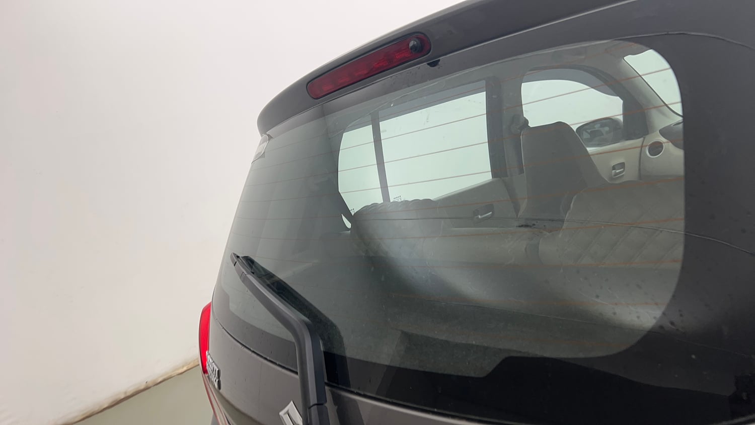 Used 2019 Maruti Suzuki Celerio ZXi (O) AMT Petrol Automatic top_features Rear defogger