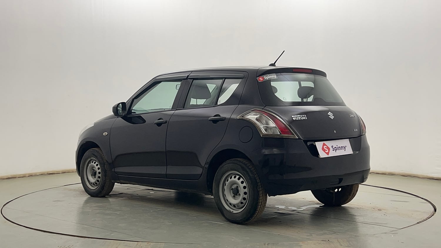 Used 2015 Maruti Suzuki Swift LXi Petrol Manual exterior LEFT REAR CORNER VIEW