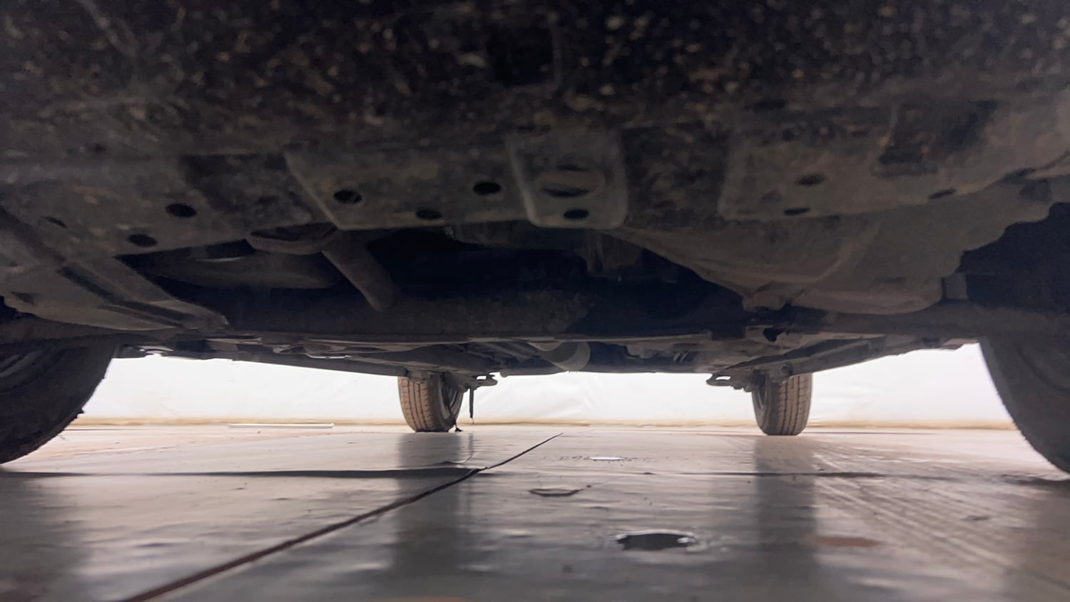 Used 2015 Maruti Suzuki Swift LXi Petrol Manual extra FRONT LEFT UNDERBODY VIEW