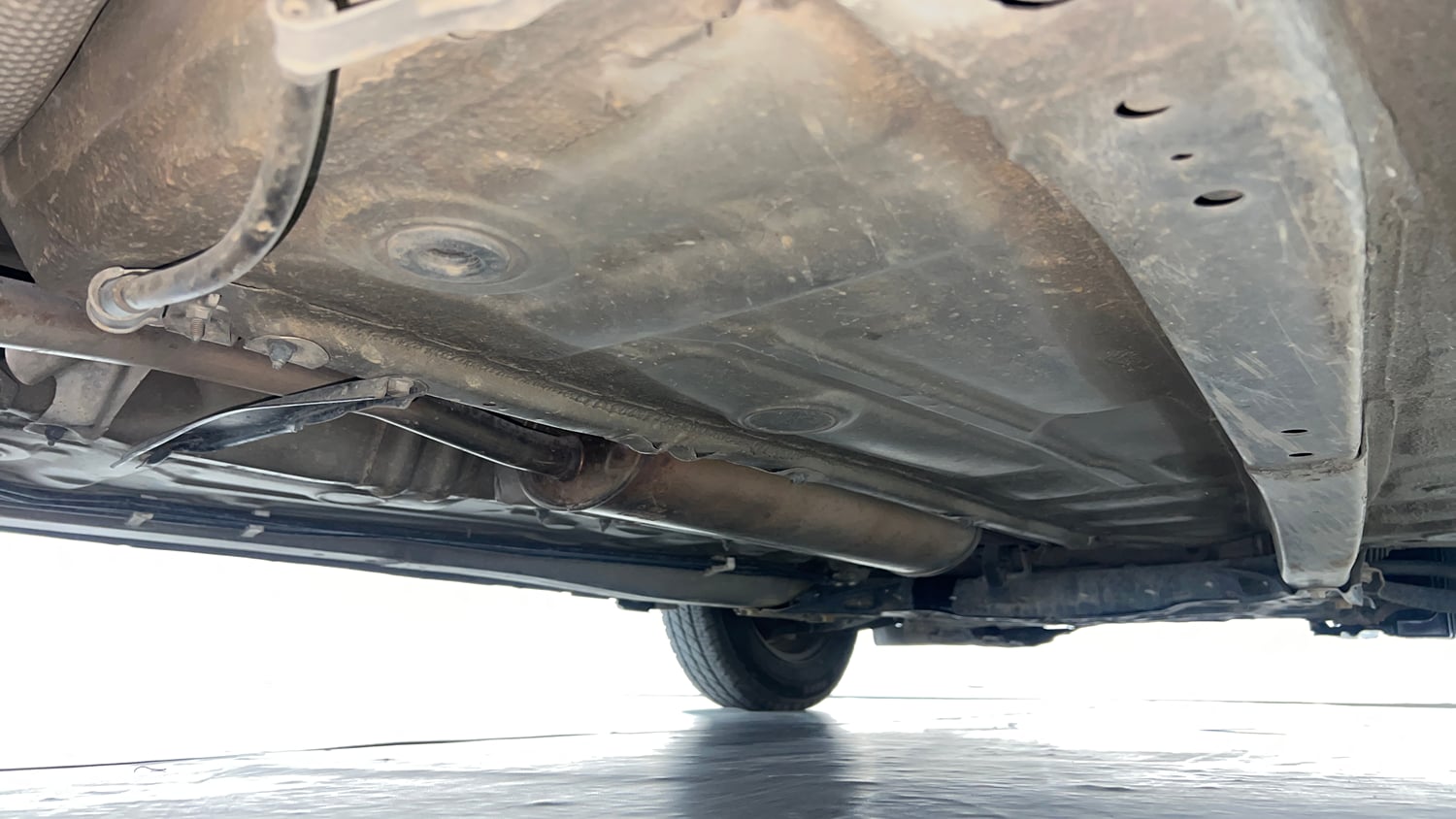 Used 2020 Maruti Suzuki Dzire VXi AMT Petrol Automatic extra REAR RIGHT UNDERBODY VIEW