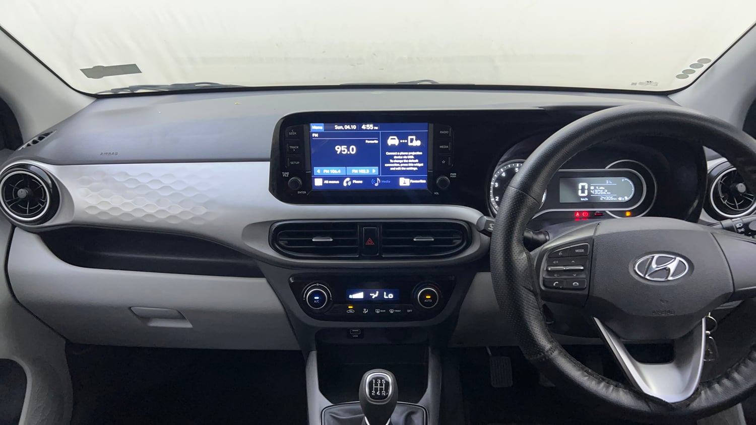 Used 2022 Hyundai Grand i10 Nios Sportz 1.2 Kappa VTVT Petrol Manual interior MUSIC SYSTEM & AC CONTROL VIEW
