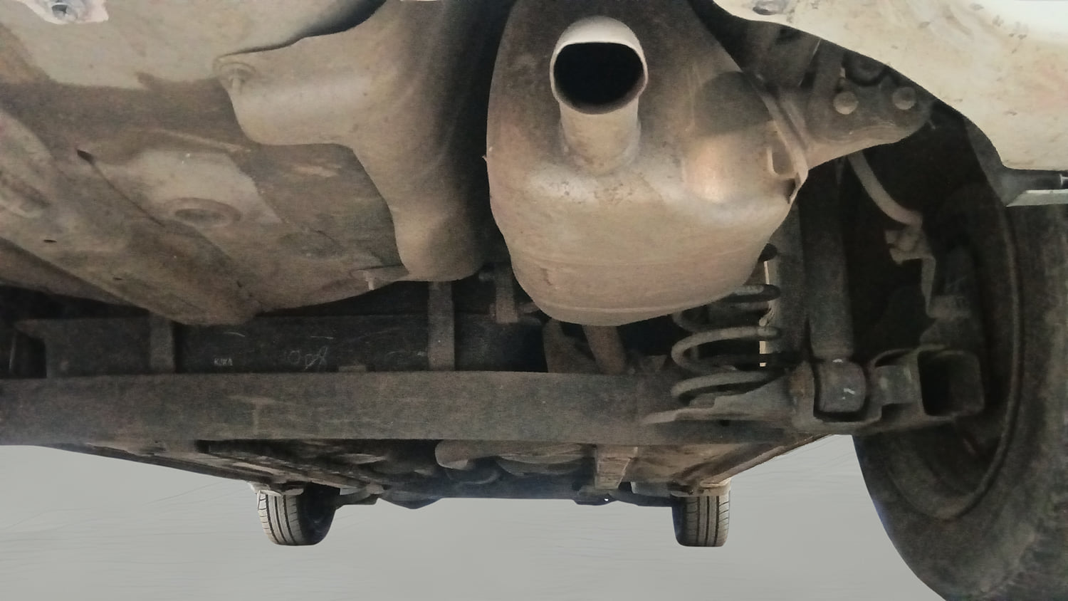 Used 2015 Hyundai Grand i10 Sportz 1.2 Kappa VTVT Petrol Manual extra REAR RIGHT UNDERBODY VIEW