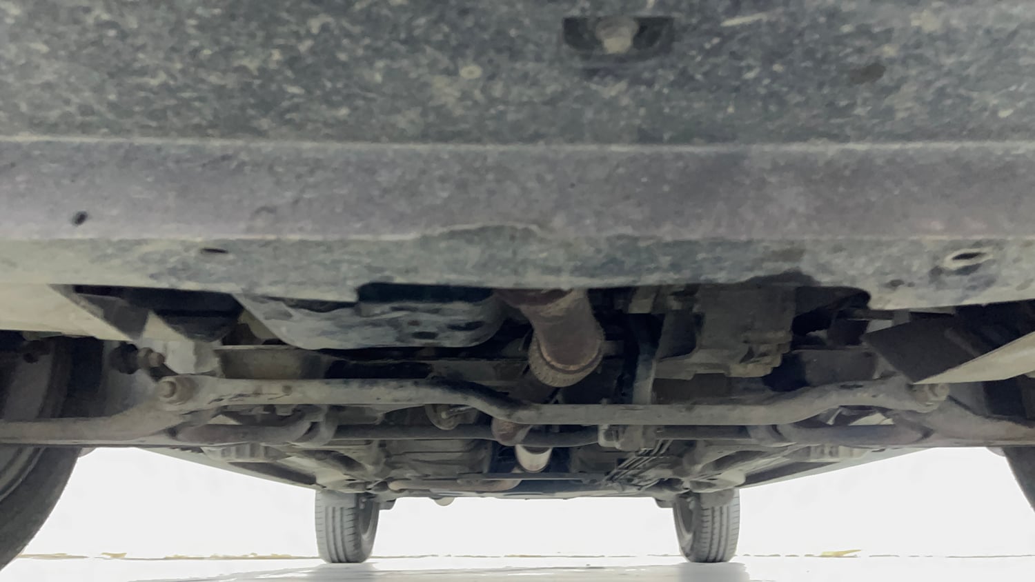 Used 2016 Tata Tiago Revotron XZ Petrol Manual extra FRONT LEFT UNDERBODY VIEW