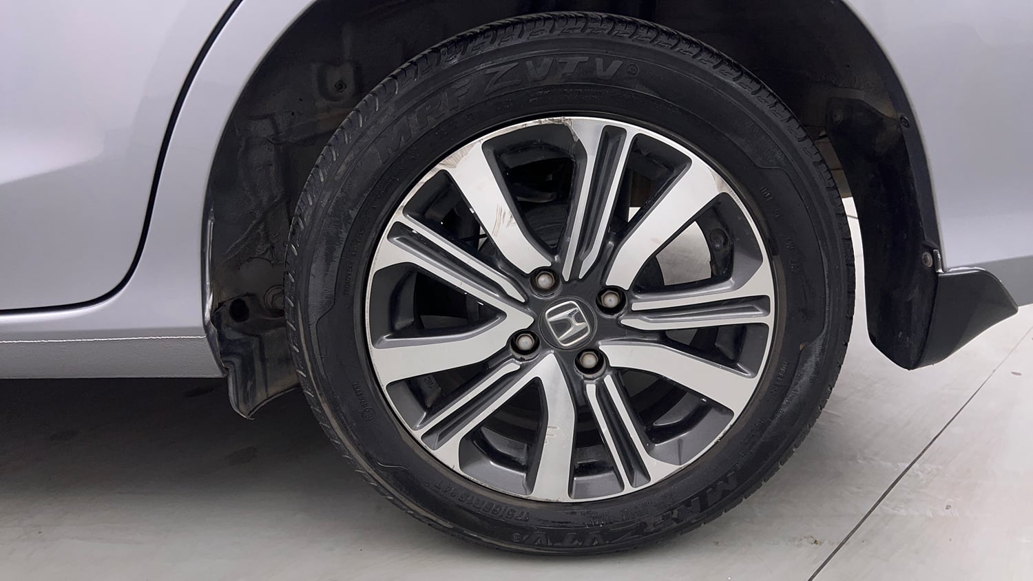 Used 2023 Honda Amaze VX CVT 1.2 Petrol Petrol Automatic tyres LEFT REAR TYRE RIM VIEW