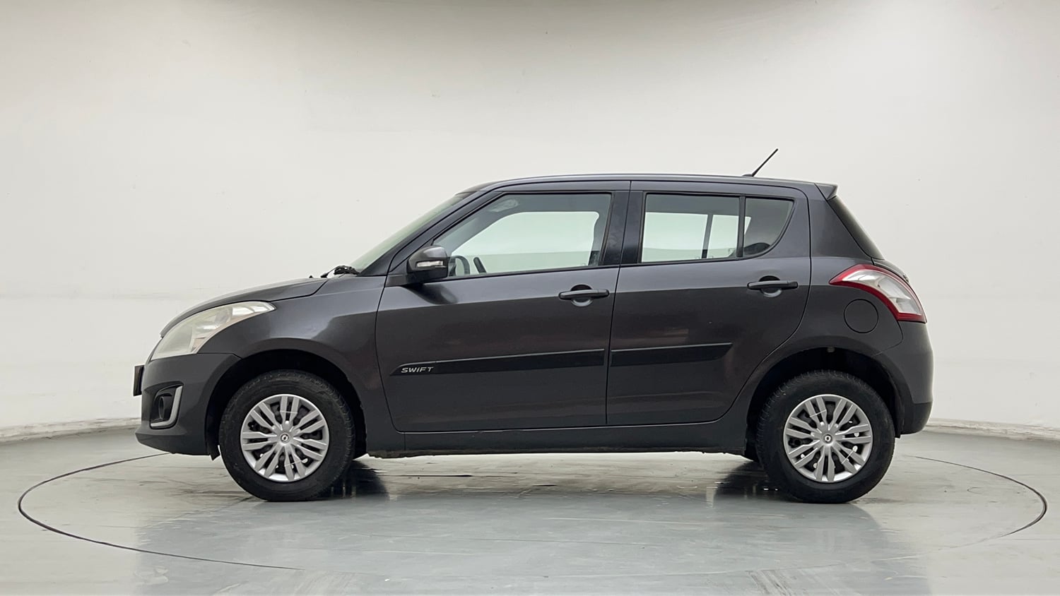 Used 2015 Maruti Suzuki Swift VXi Petrol Manual exterior LEFT SIDE VIEW