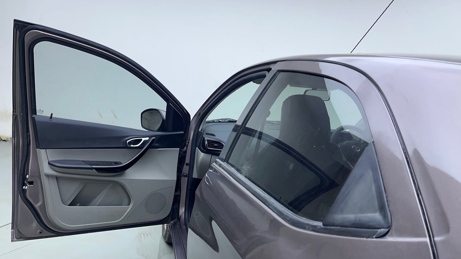 Used 2016 Tata Tiago Revotron XZ Petrol Manual interior LEFT FRONT DOOR OPEN VIEW