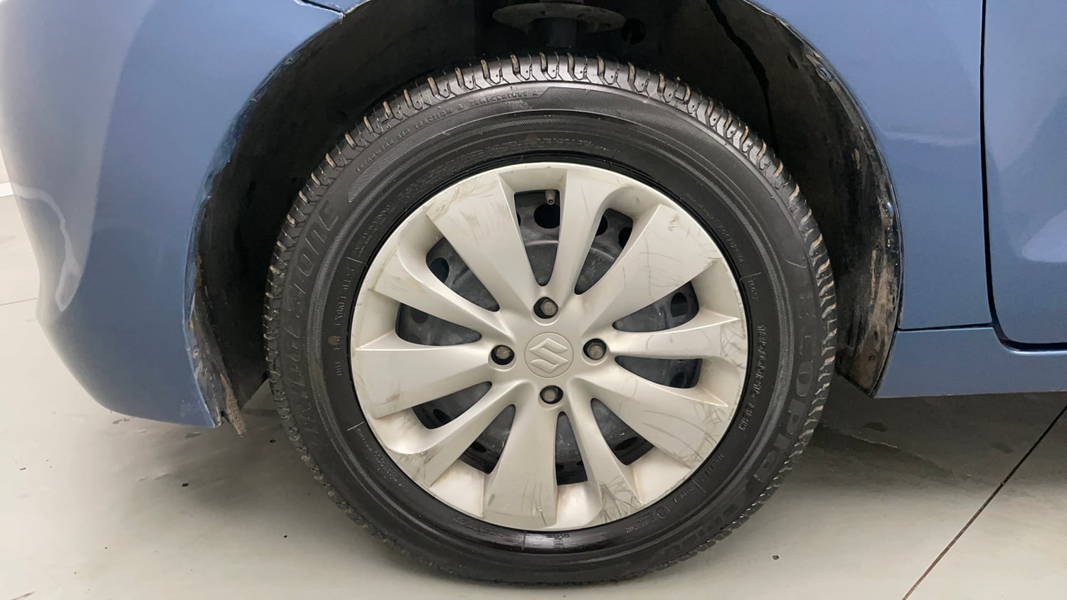 Used 2017 Maruti Suzuki Baleno Delta 1.2 Petrol Manual tyres LEFT FRONT TYRE RIM VIEW