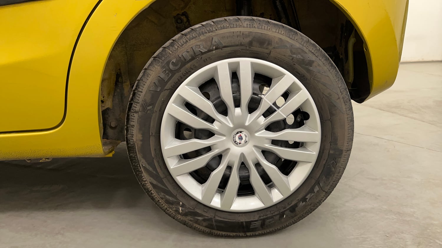 Used 2015 Maruti Suzuki Celerio VXi AMT Petrol Automatic tyres LEFT REAR TYRE RIM VIEW