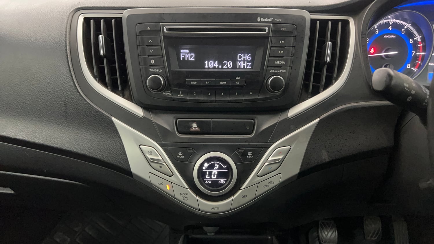 Used 2016 Maruti Suzuki Baleno Zeta 1.2 Petrol Manual interior MUSIC SYSTEM & AC CONTROL VIEW