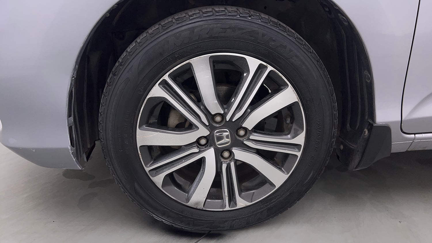 Used 2023 Honda Amaze VX CVT 1.2 Petrol Petrol Automatic tyres LEFT FRONT TYRE RIM VIEW