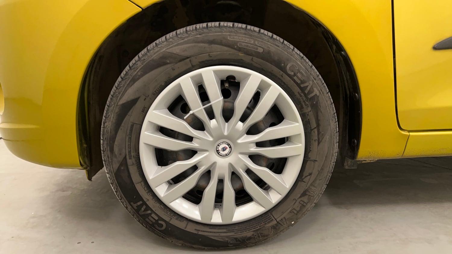 Used 2015 Maruti Suzuki Celerio VXi AMT Petrol Automatic tyres LEFT FRONT TYRE RIM VIEW