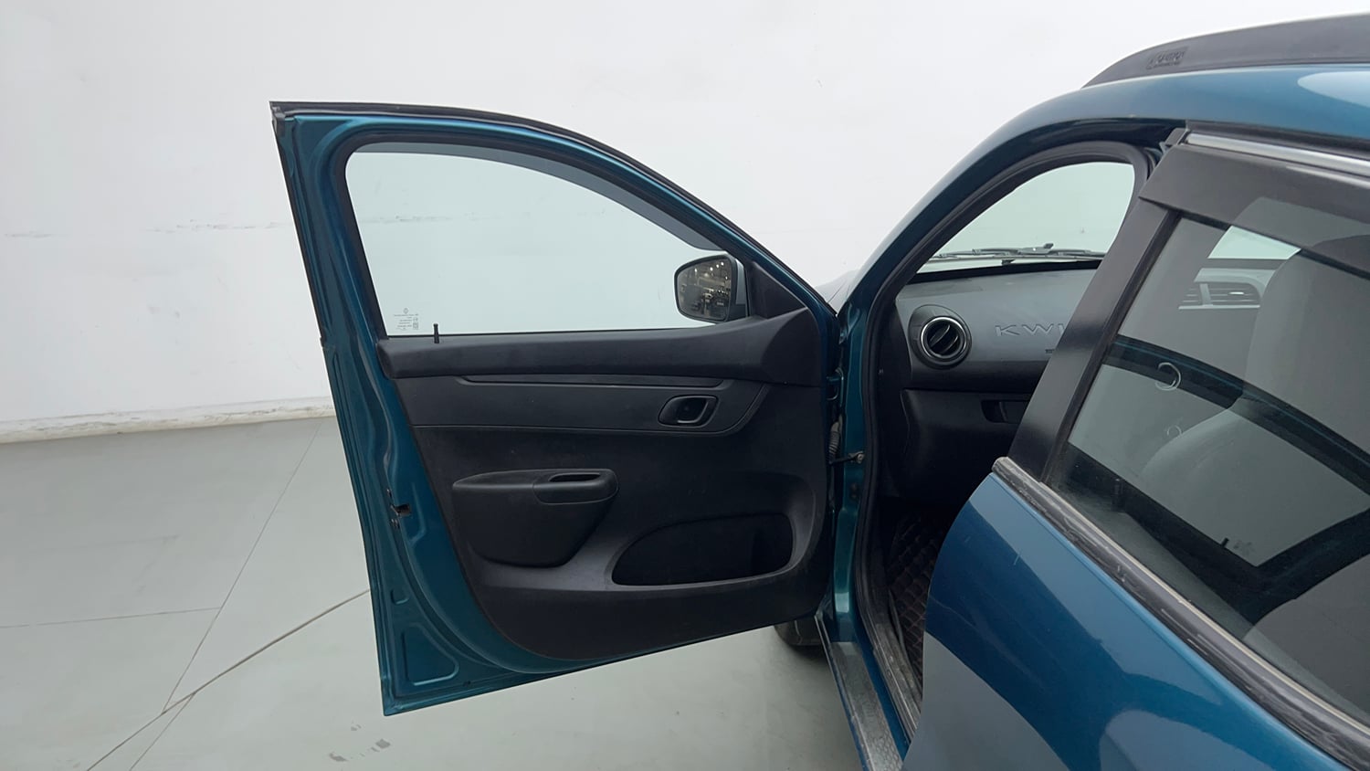 Used 2022 Renault Kwid RXT 1.0 Petrol Manual interior LEFT FRONT DOOR OPEN VIEW