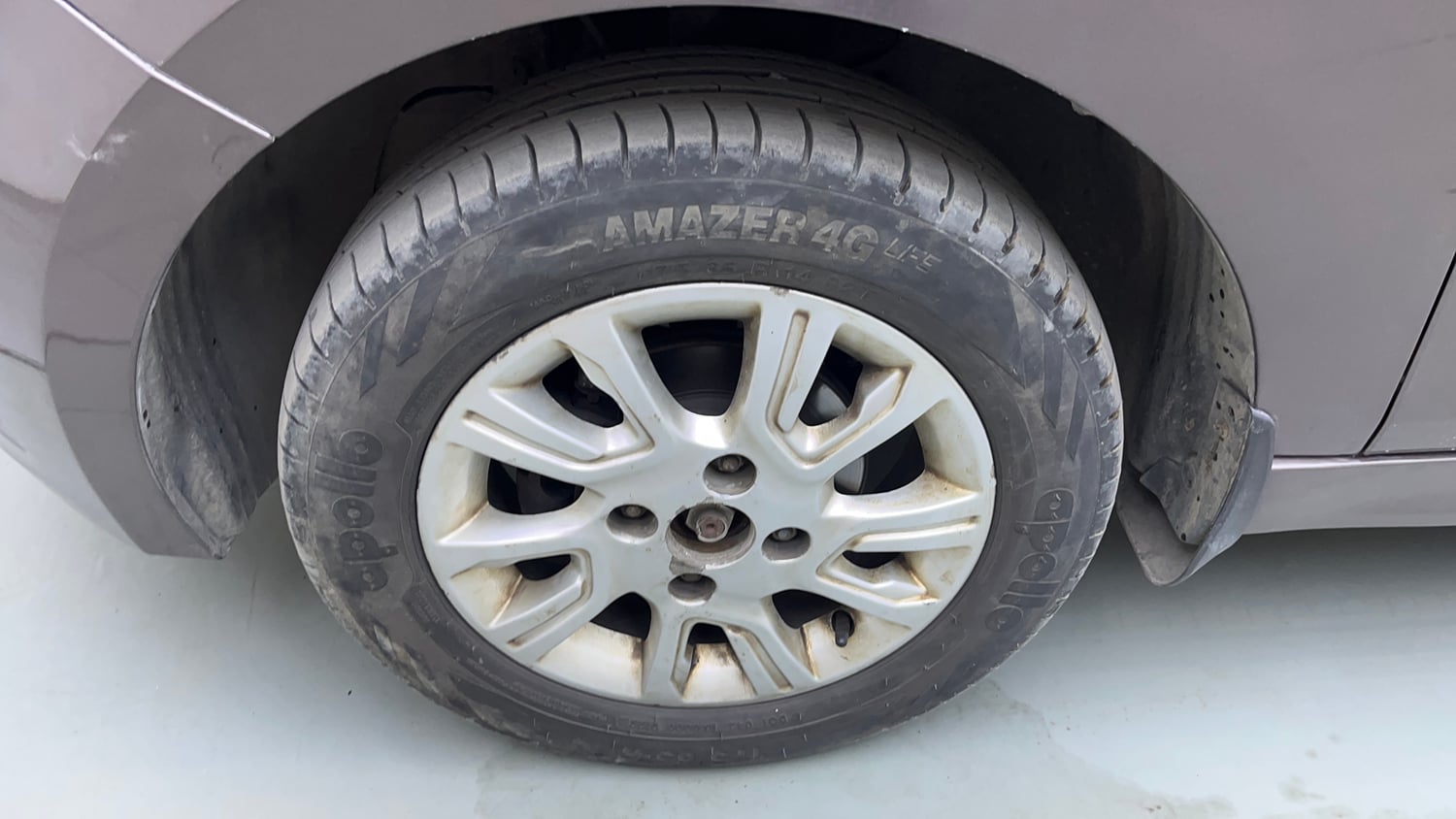 Used 2016 Tata Tiago Revotron XZ Petrol Manual tyres LEFT FRONT TYRE RIM VIEW