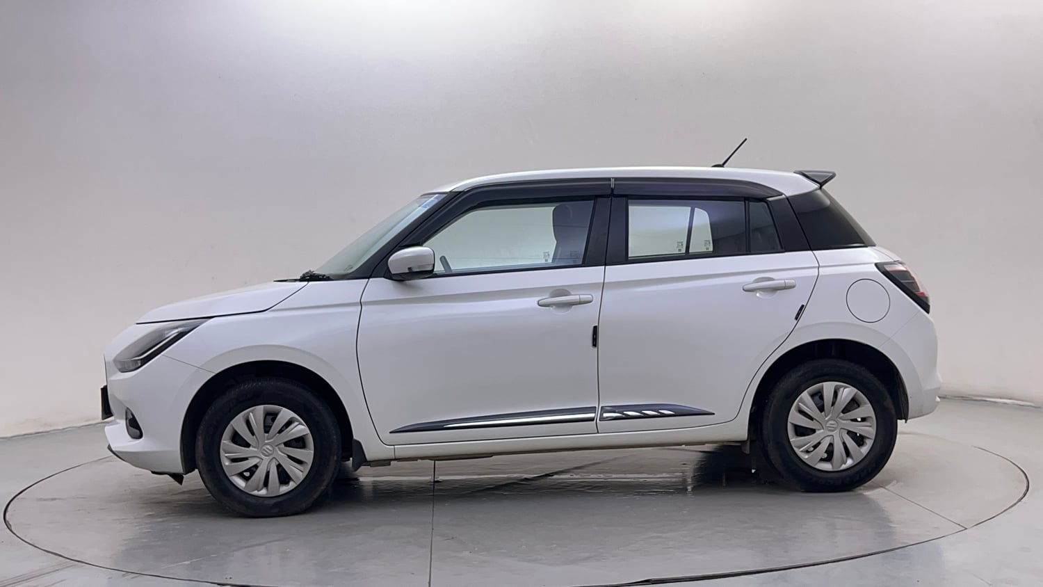 Used 2026 Maruti Suzuki Swift VXi AMT Petrol Automatic exterior LEFT SIDE VIEW