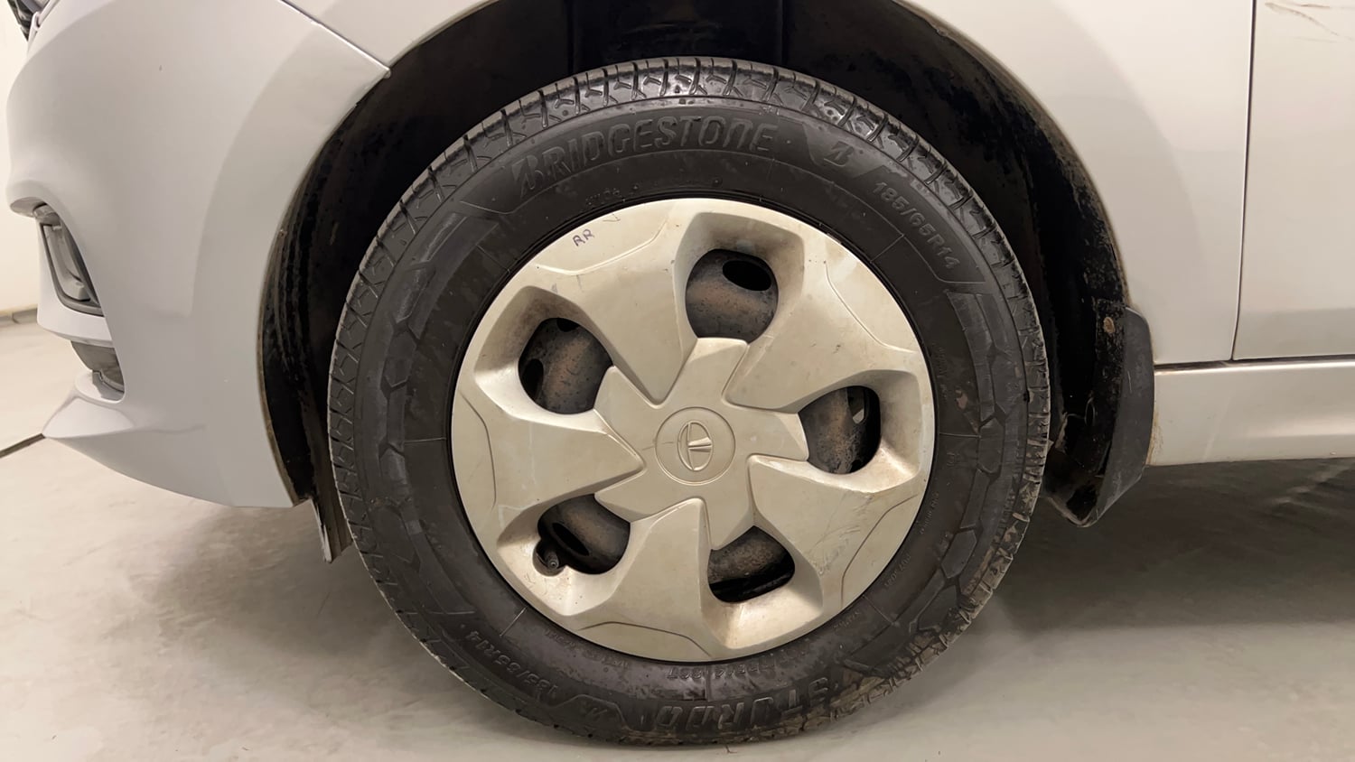 Used 2020 Tata Tigor XM Petrol Manual tyres LEFT FRONT TYRE RIM VIEW