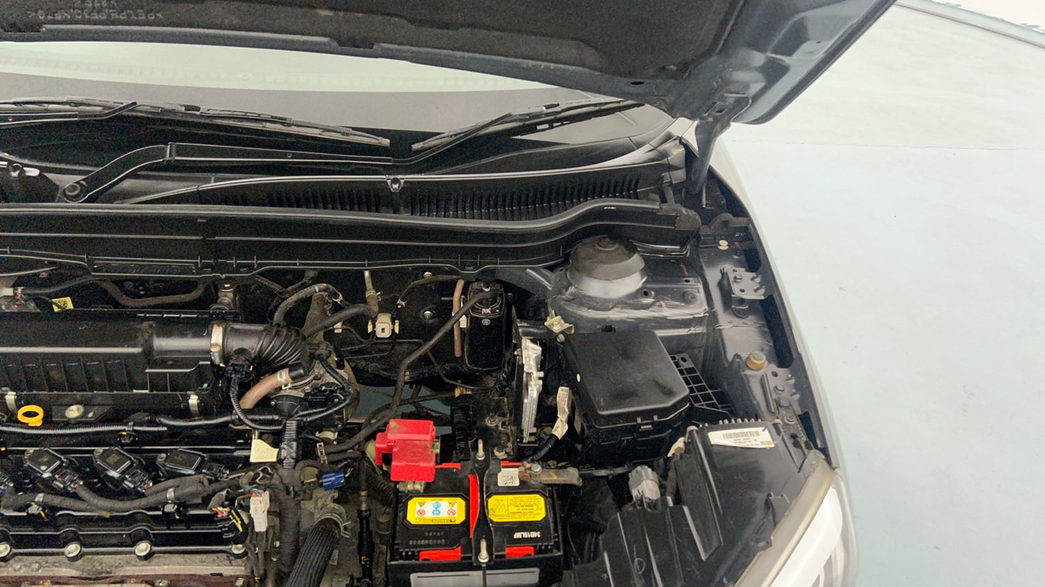 Used 2022 maruti-suzuki Vitara Brezza ZXi Plus Petrol Manual engine ENGINE LEFT SIDE HINGE & APRON VIEW
