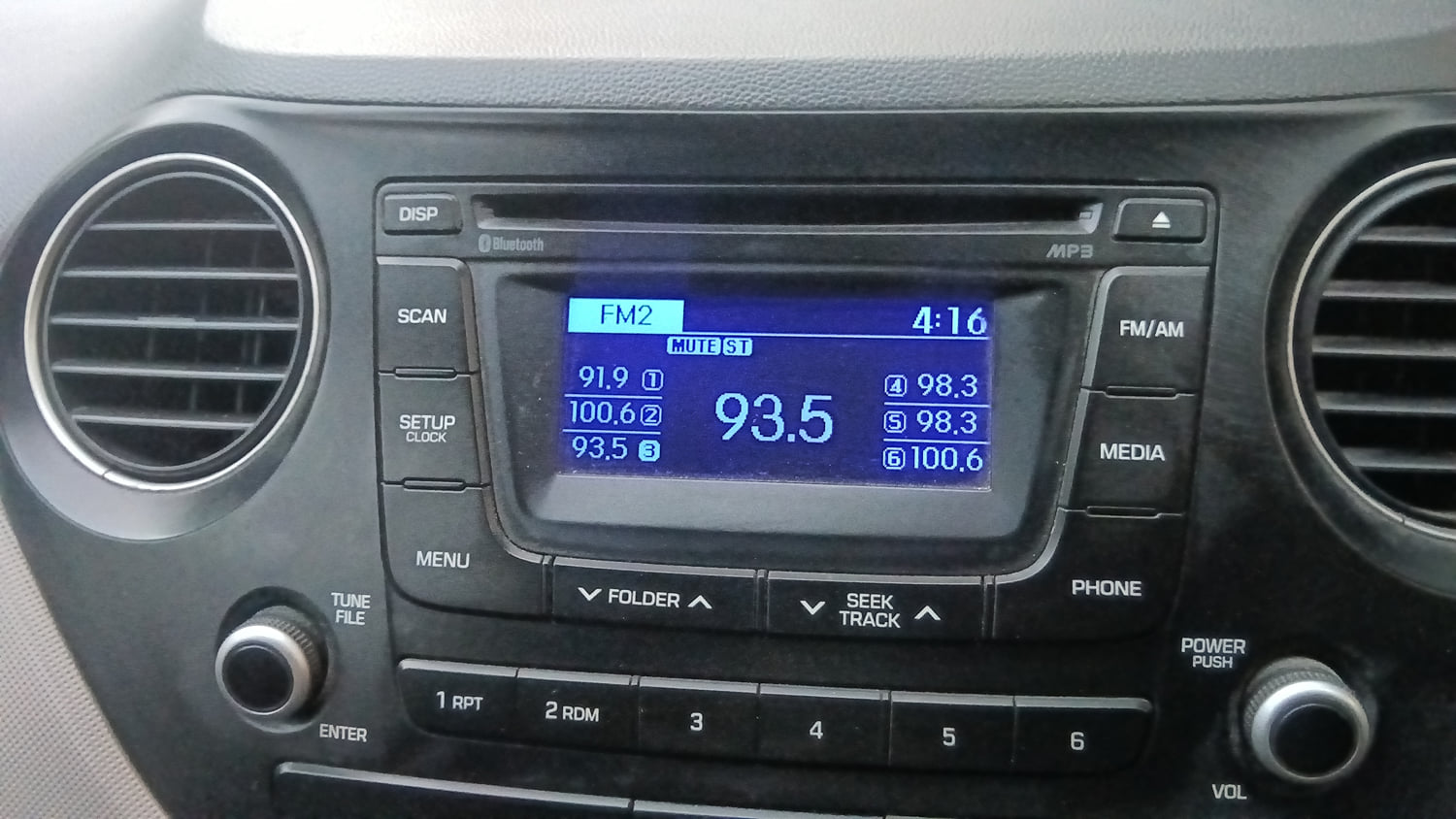 Used 2015 Hyundai Grand i10 Sportz 1.2 Kappa VTVT Petrol Manual interior MUSIC SYSTEM & AC CONTROL VIEW