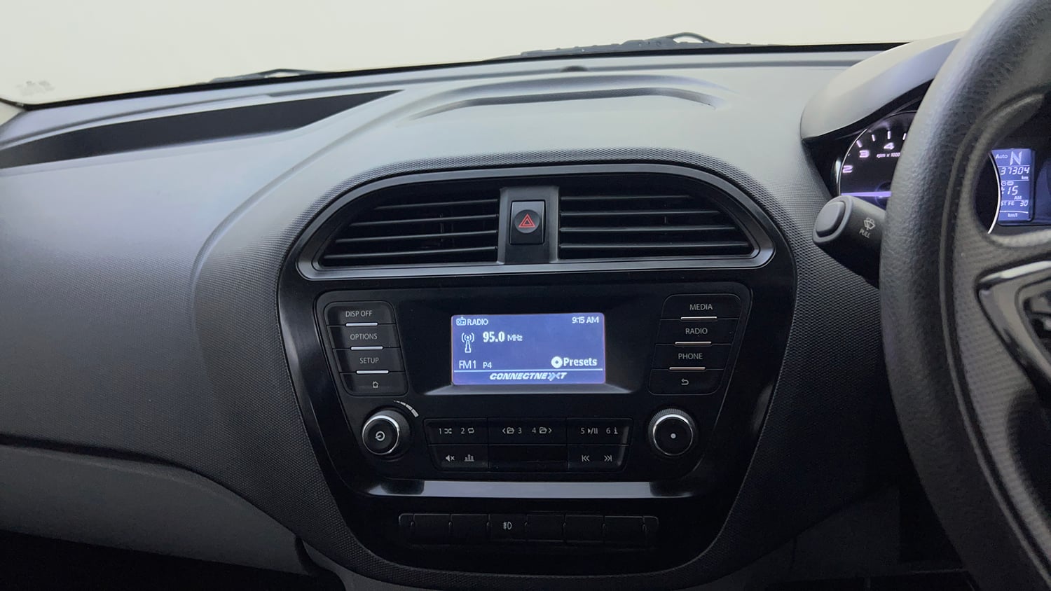 Used 2018 Tata Tigor Revotron XTA Petrol Automatic top_features Integrated (in-dash) music system