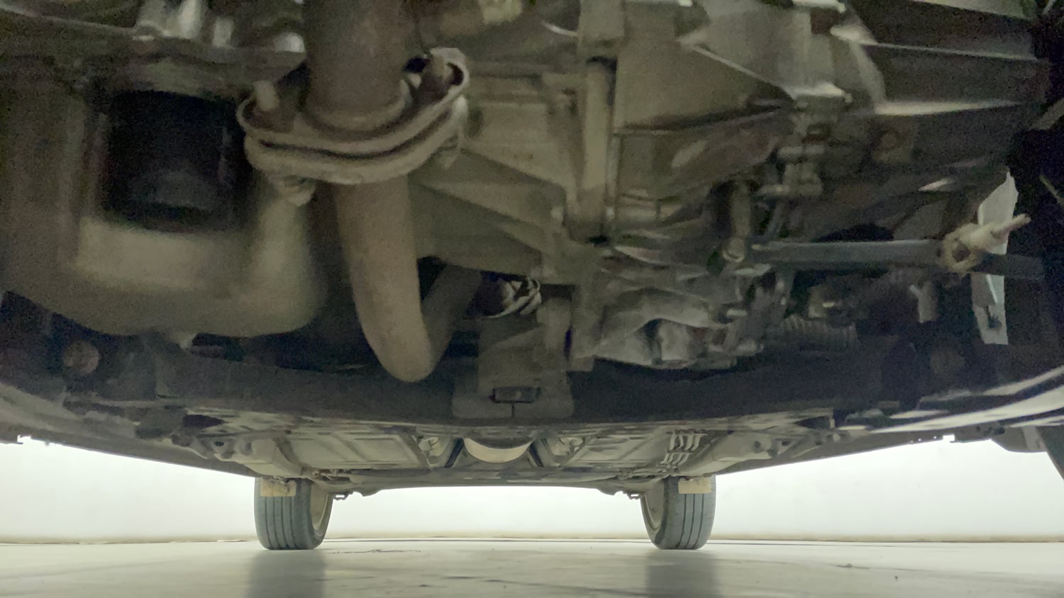 Used 2020 Maruti Suzuki Baleno Zeta Petrol Manual extra FRONT LEFT UNDERBODY VIEW