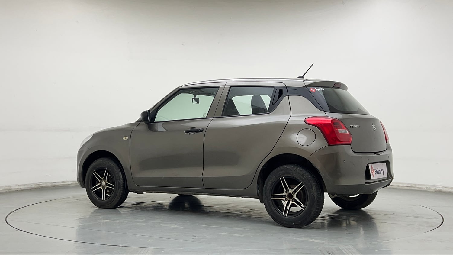 Used 2020 Maruti Suzuki Swift LXi Petrol Manual exterior LEFT REAR CORNER VIEW