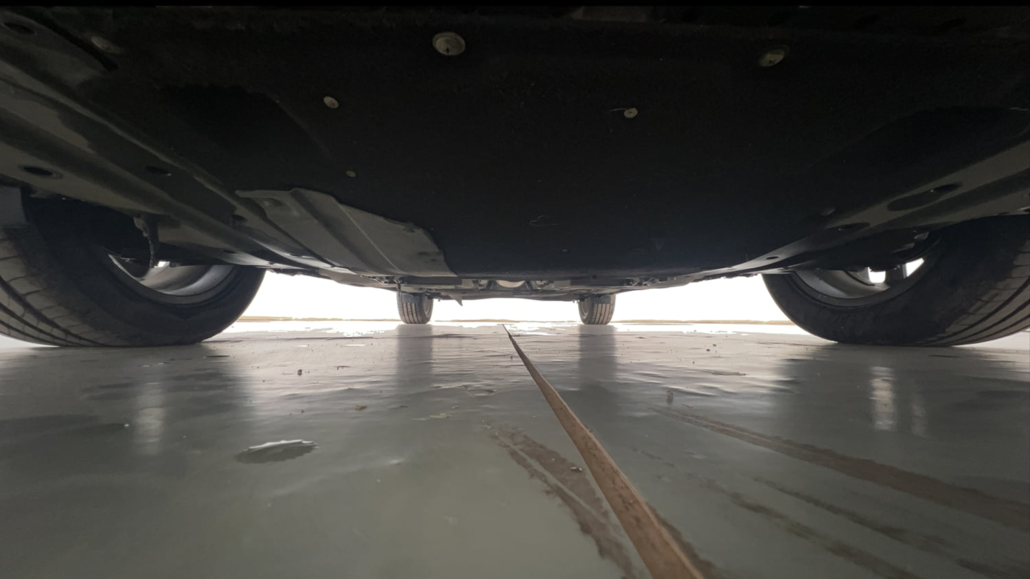 Used 2022 Maruti Suzuki Baleno Alpha AGS Petrol Automatic extra FRONT LEFT UNDERBODY VIEW
