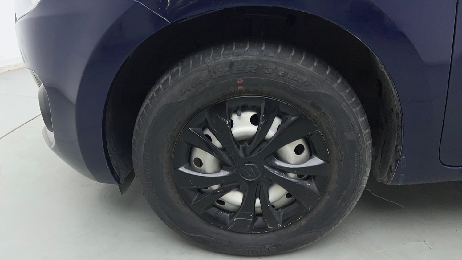 Used 2019 Maruti Suzuki Swift LXi Petrol Manual tyres LEFT FRONT TYRE RIM VIEW