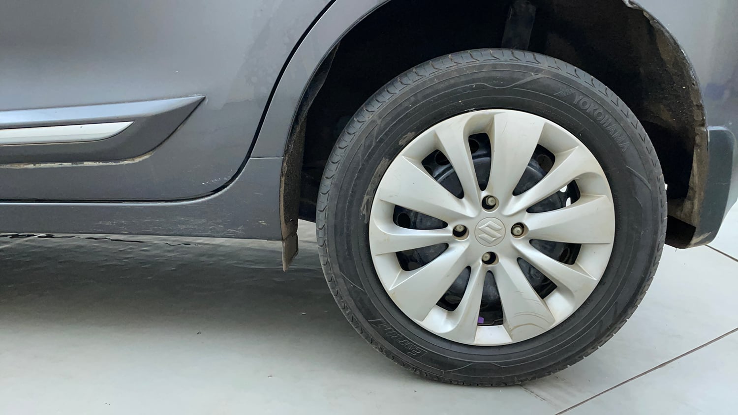 Used 2017 Maruti Suzuki Baleno Delta 1.2 AT Petrol Automatic tyres LEFT REAR TYRE RIM VIEW
