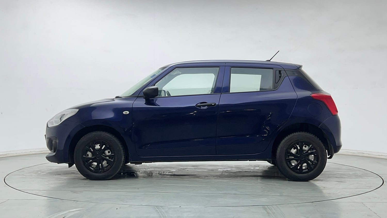 Used 2019 Maruti Suzuki Swift LXi Petrol Manual exterior LEFT SIDE VIEW