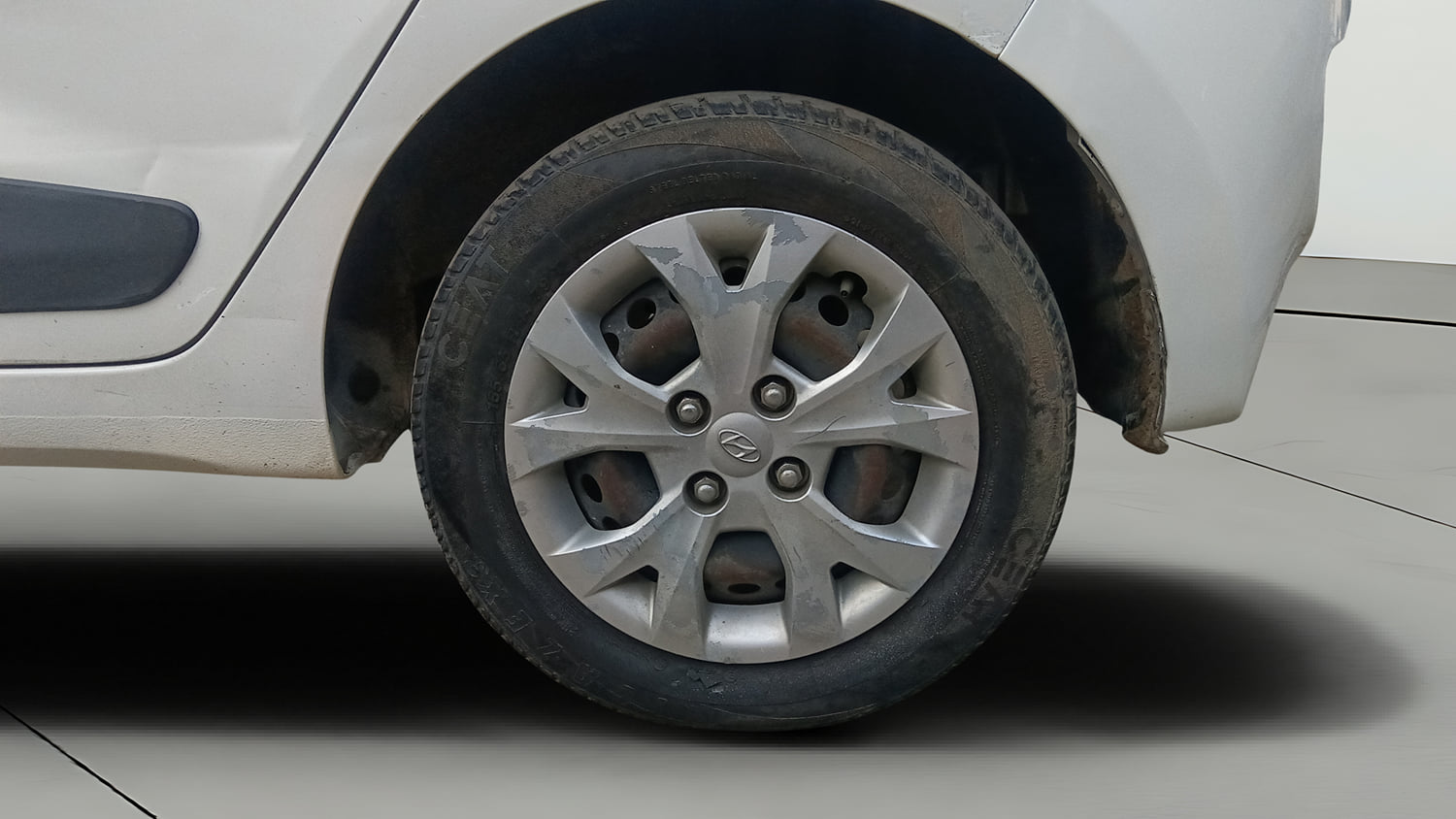 Used 2015 Hyundai Grand i10 Sportz 1.2 Kappa VTVT Petrol Manual tyres LEFT REAR TYRE RIM VIEW